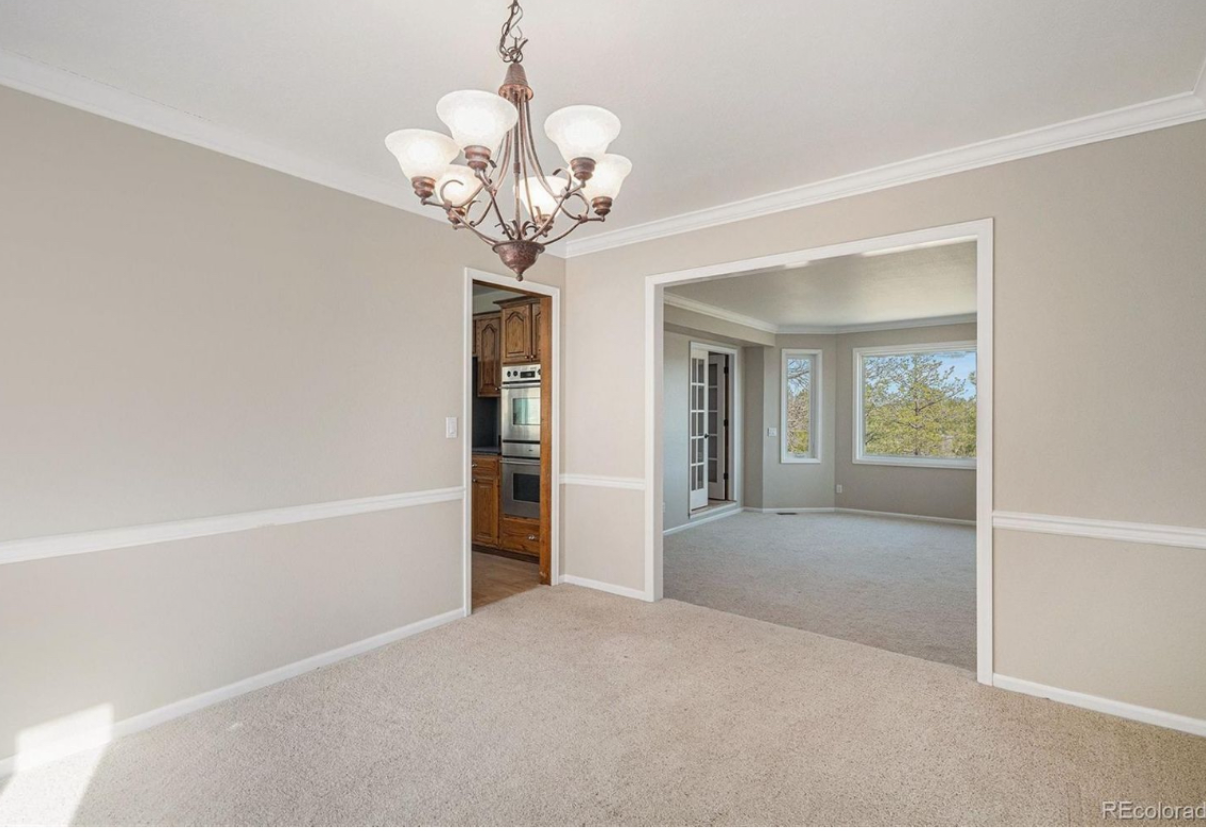 Formal dining room with chandelier